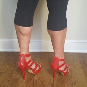 calves in red stilettos